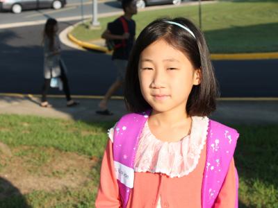 photo of girl coming to school
